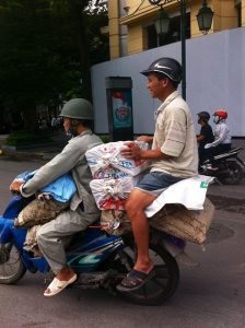 Overloaded motorcycle in Hanoi