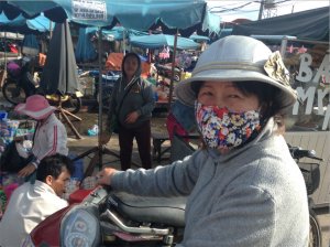 ap-vietnam-hoi-an-hoi-an-people-almost-alwyas-wer-face-masks-while-riding-motorcycles