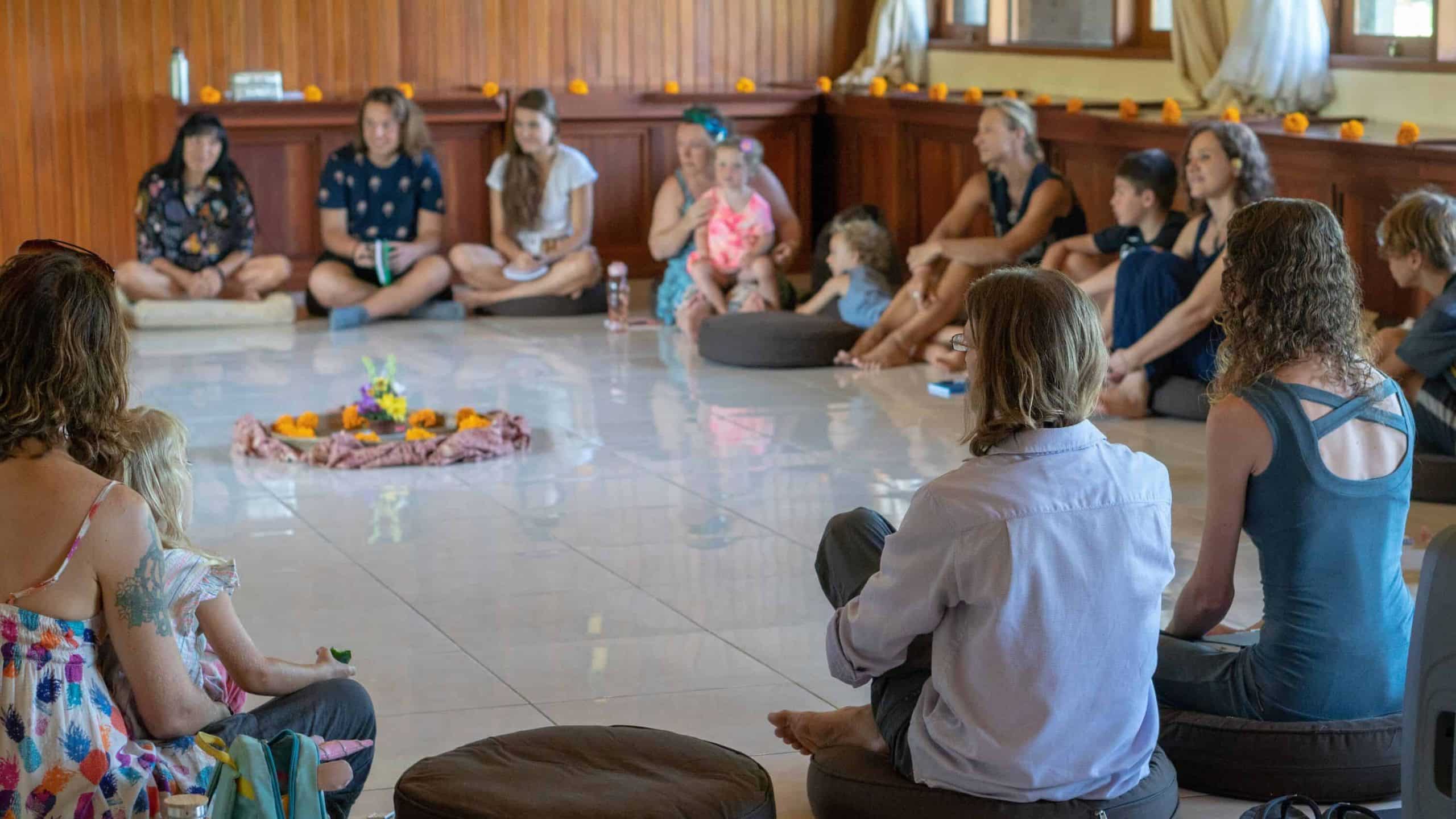 Group of people sitting in a circle 