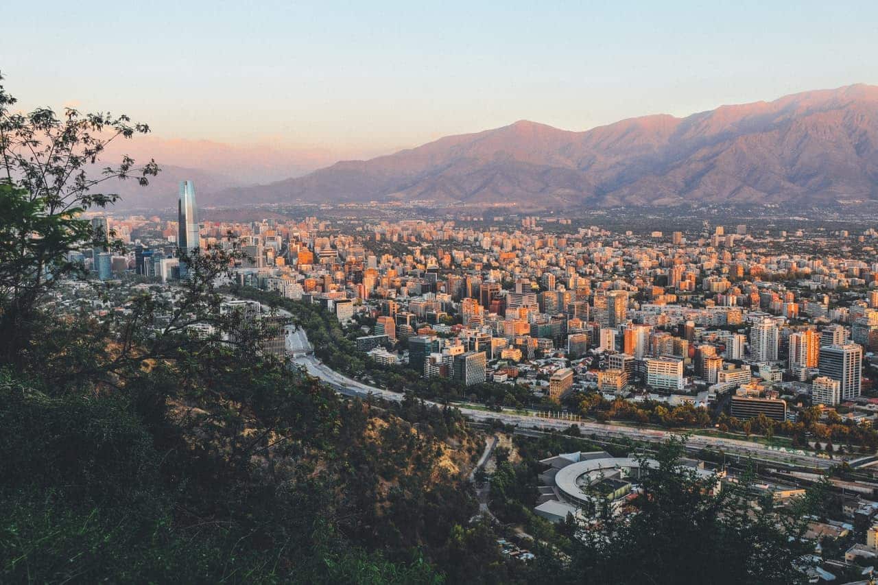 aerial view of the city right next to the mountains