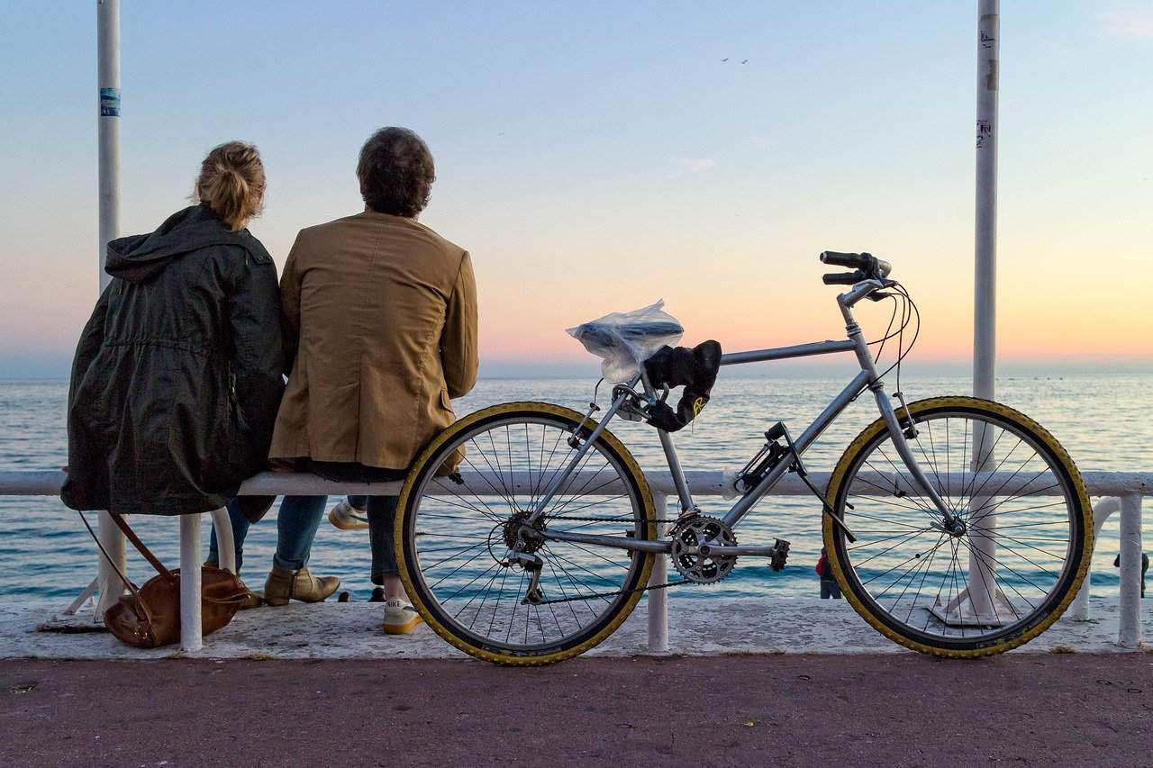 Couple sitting after riding their bike