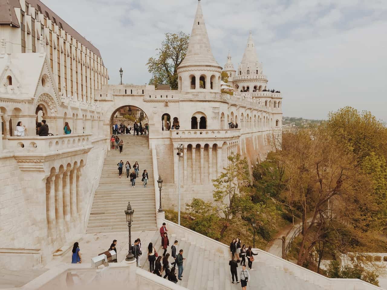 aerial view of a building with people walking around