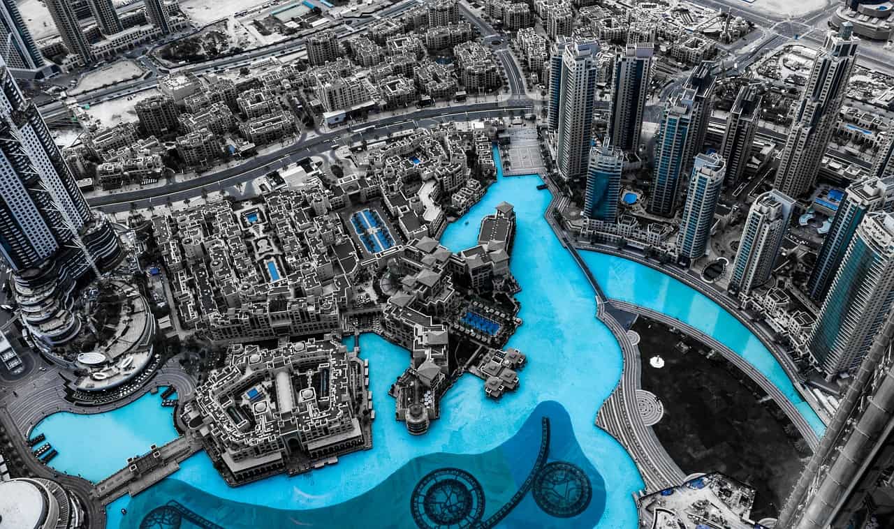 aerial view with pools and highrise buildings in Dubai