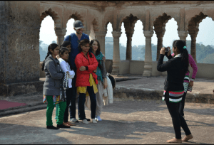 Ezra and Rael posing with a group of Indian girls who stopped them for a photo