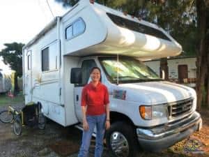 Woman in front of her RV
