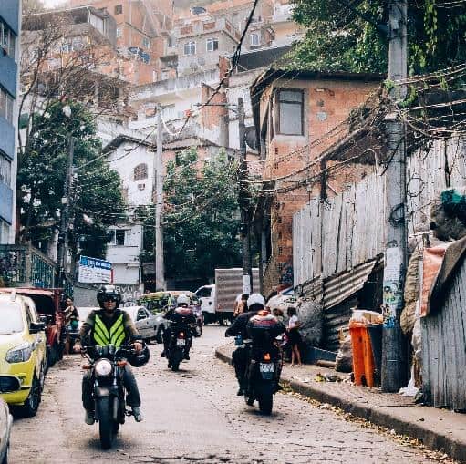 men on bikes in city in Brazil
