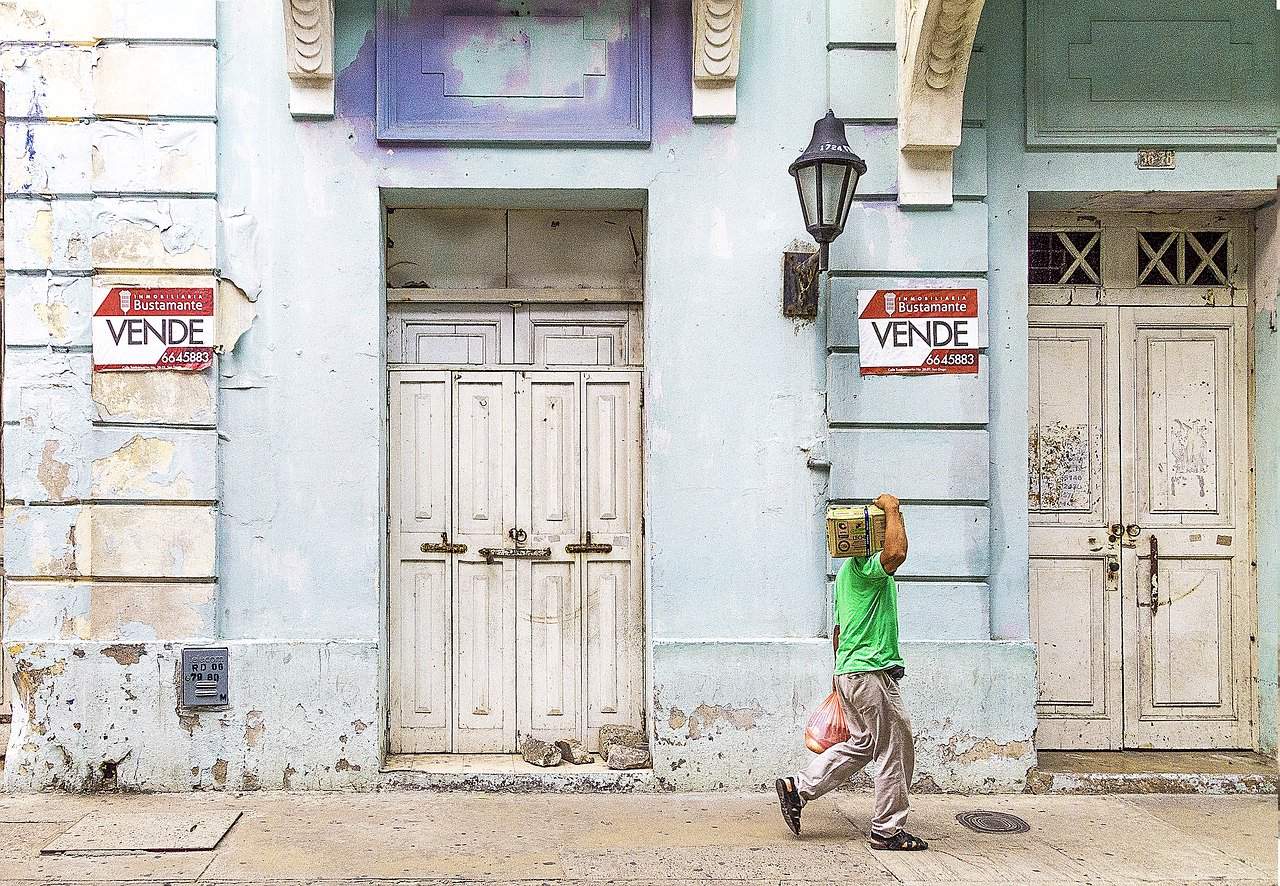 Man carrying box on his shoulder