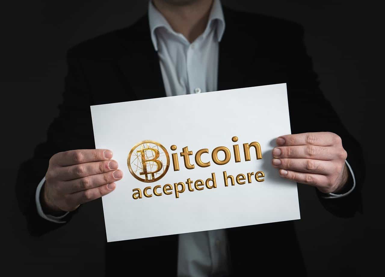Sign says 'Bitcoin accepted here'