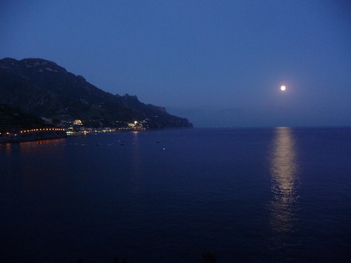 Night ski with the moon coming up on the Amalfi coast