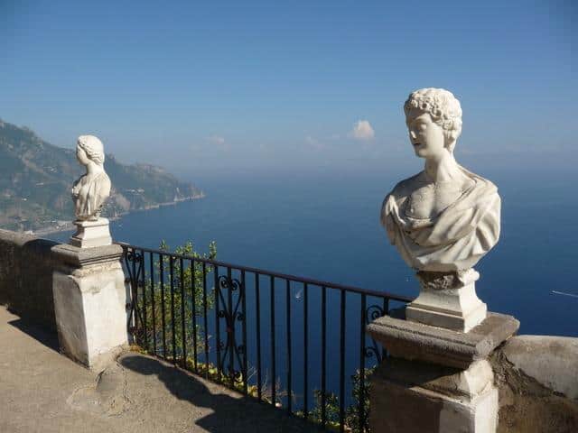 Two statutes overlooking the Amalfi coast