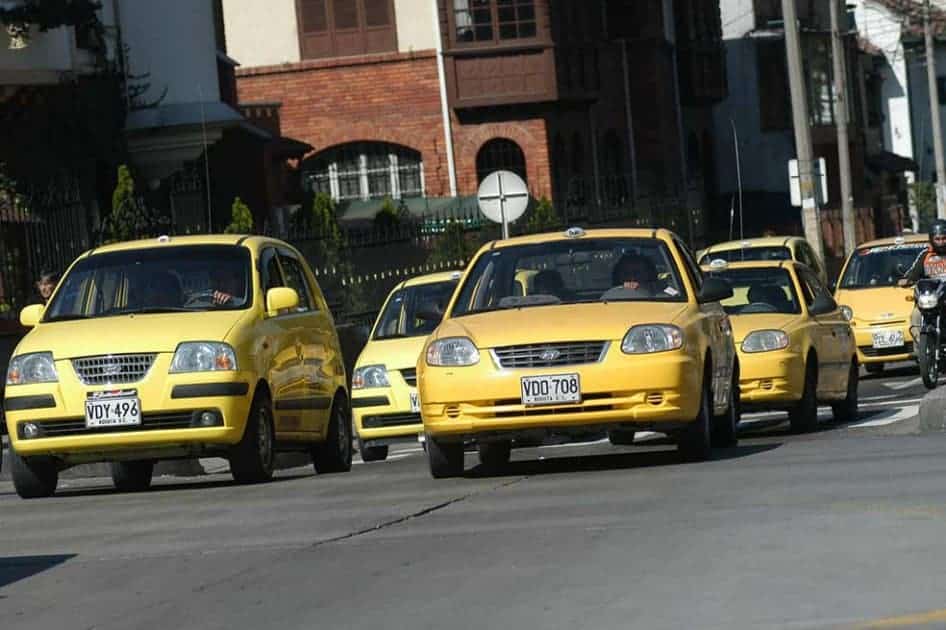 two rows of taxis in Medellin Colombia