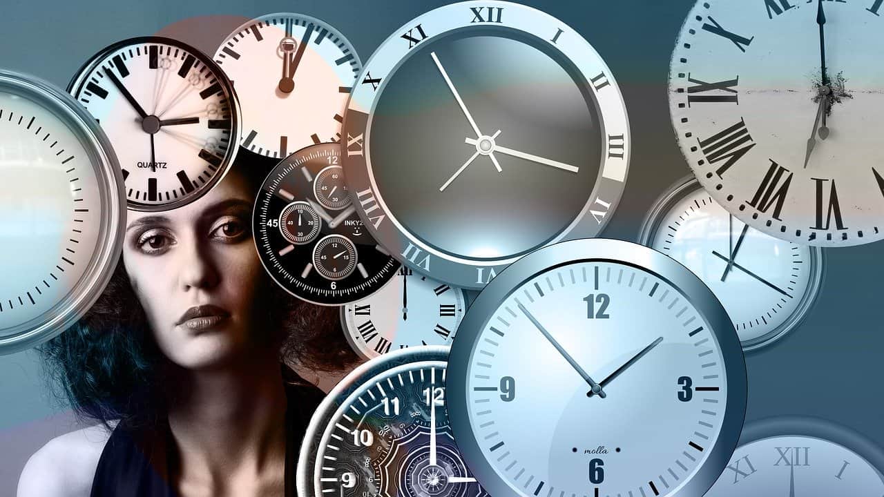 woman with lots of clocks