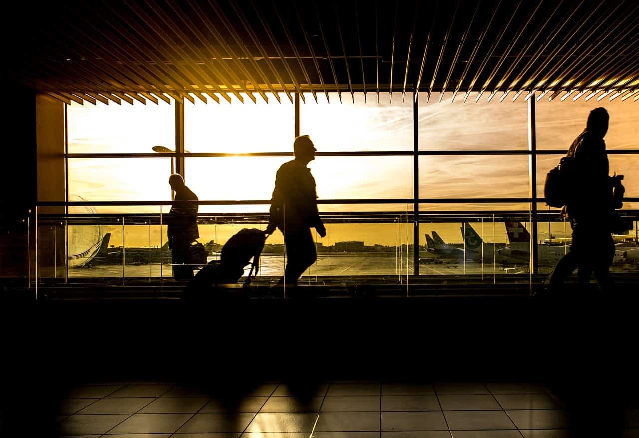 People walking through the airport