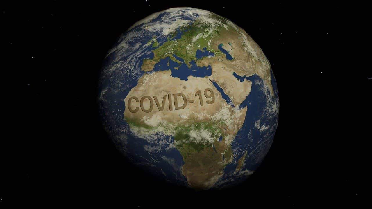 Map of the world with Covid-19 on it