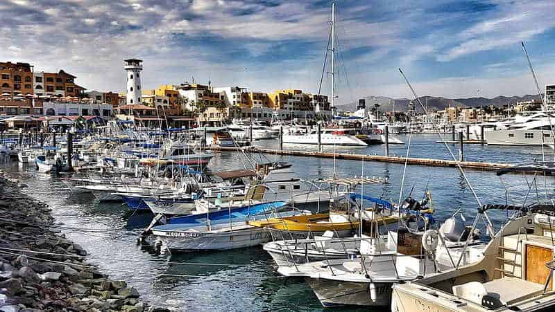 row of boats at a beautiful port