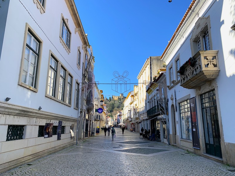 Tomar Streets with Knights Templar Castle Overlooking the Town