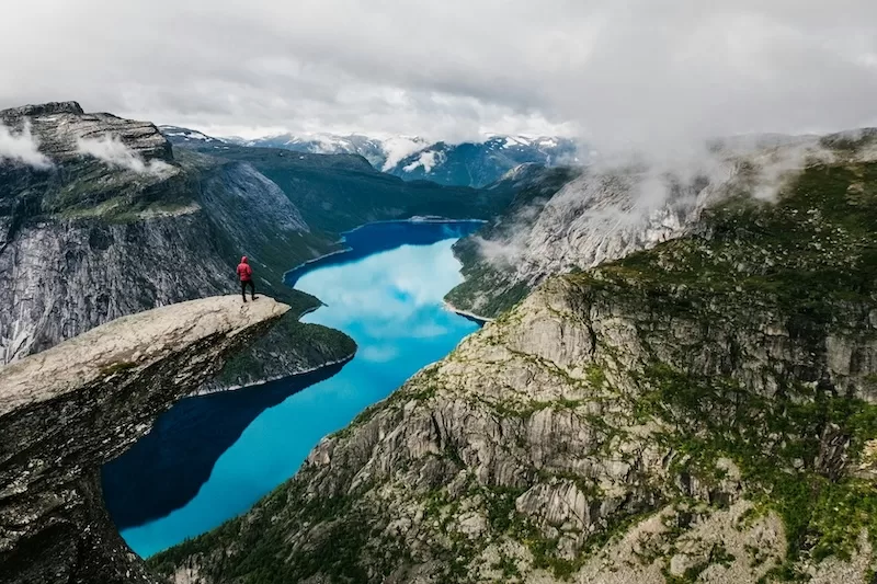 Summer hikes through fjords and forested trails unlock remote beauty. 