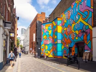 A large mural adorns the exterior of the London Graphic Centre.