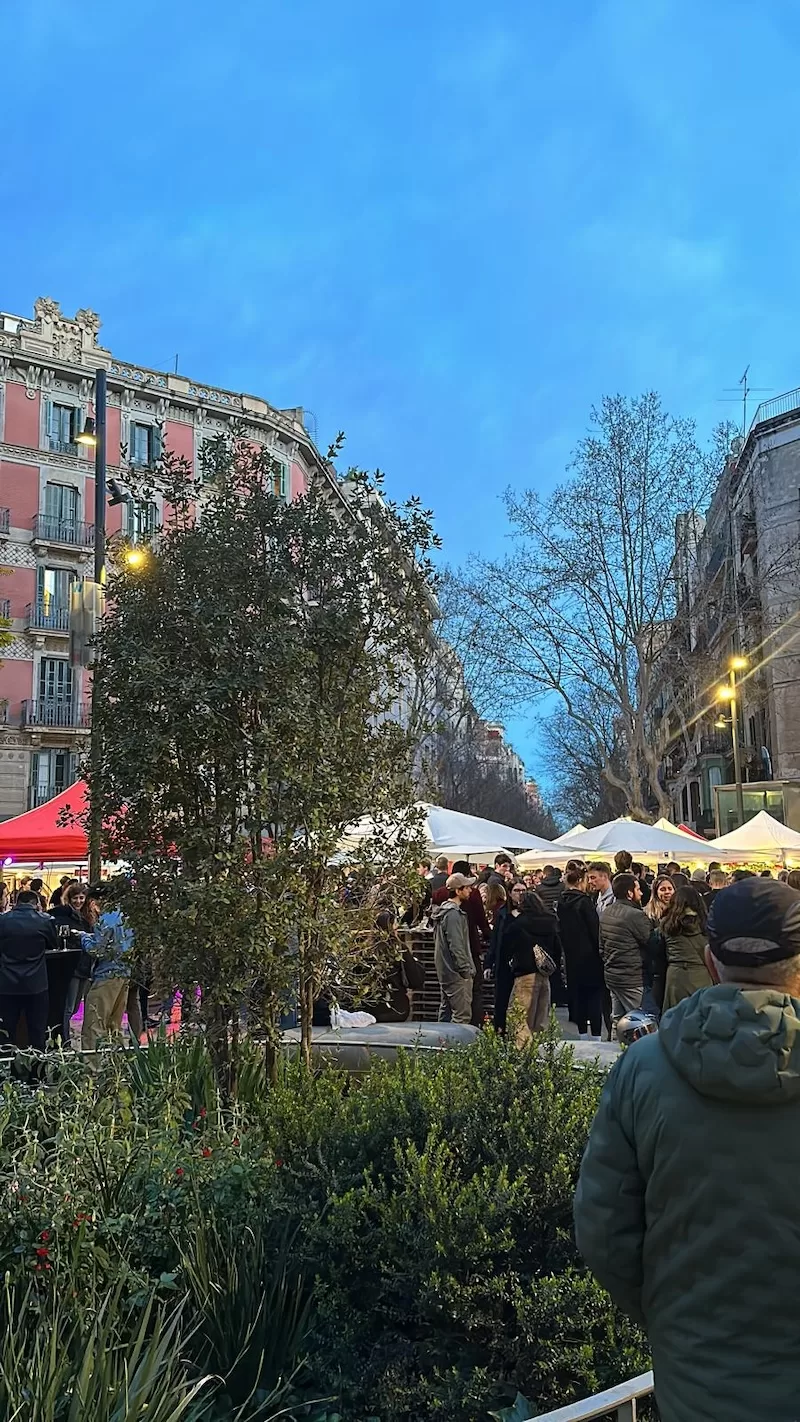 A Saturday night street party in full swing where joy is stitched into the ordinary.