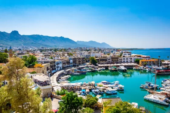 The historic harbor blends Ottoman architecture with modern Mediterranean charm.