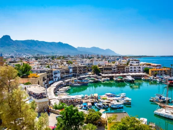 The historic harbor blends Ottoman architecture with modern Mediterranean charm.