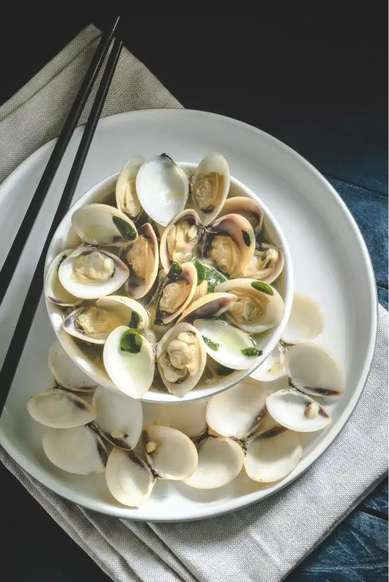 Portuguese Food: Clams Bulhão Pato, cooked with garlic, cilantro, white wine, and lemon