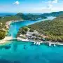 Croatias Tourism: Aerial view of Croatia’s stunning Adriatic coastline, where historic towns meet turquoise waters