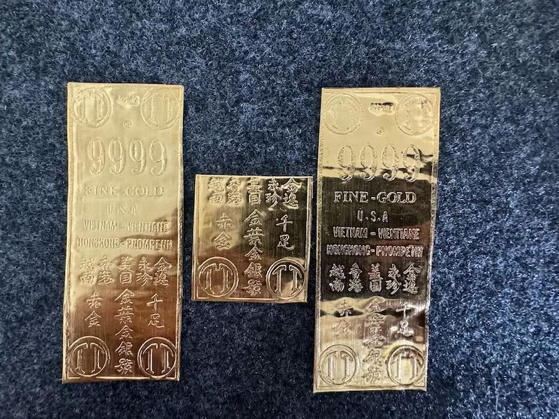 Close-up of 24-karat gold Taels - a symbol of enduring value when paper currencies collapse
