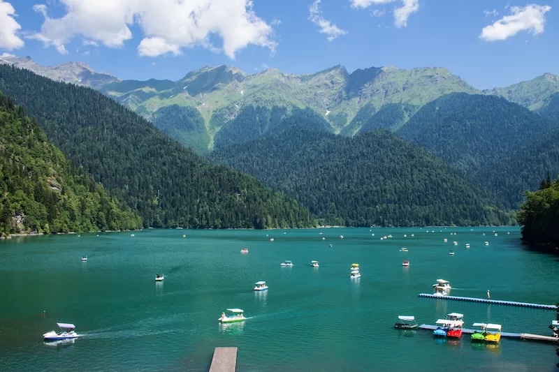 Lake Ritsa glimmers beneath the Caucasus peaks