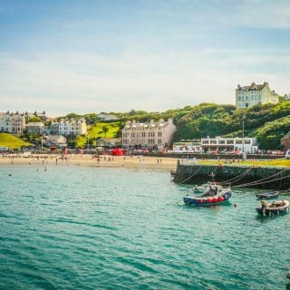 Craggy cliffs and quiet harbors frame life in the Isle of Man