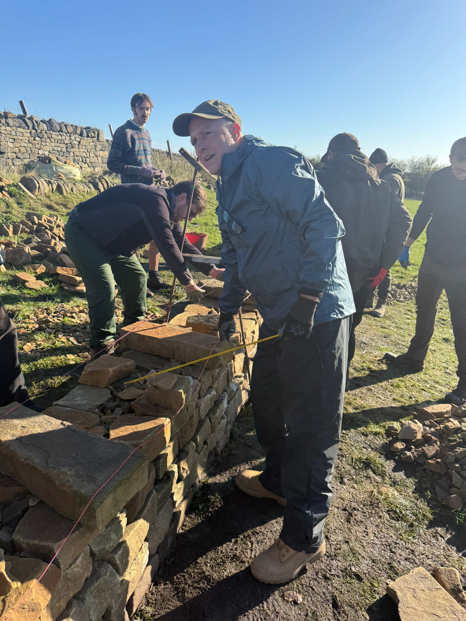 Rebuilding, stone by stone, layer by layer.