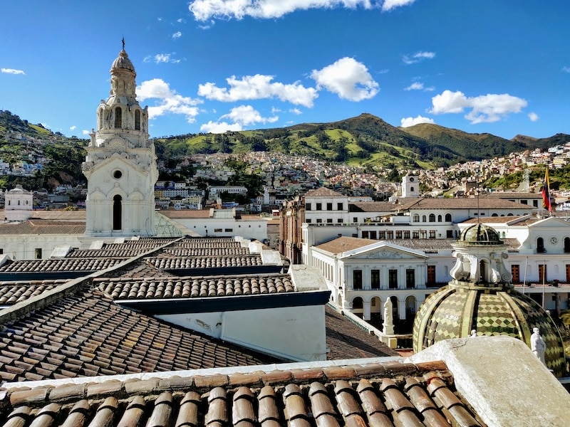 Quito’s historic center unfolds beneath the Andes, where domed churches and whitewashed towers meet mountain light. A UNESCO World Heritage gem suspended between past and sky.