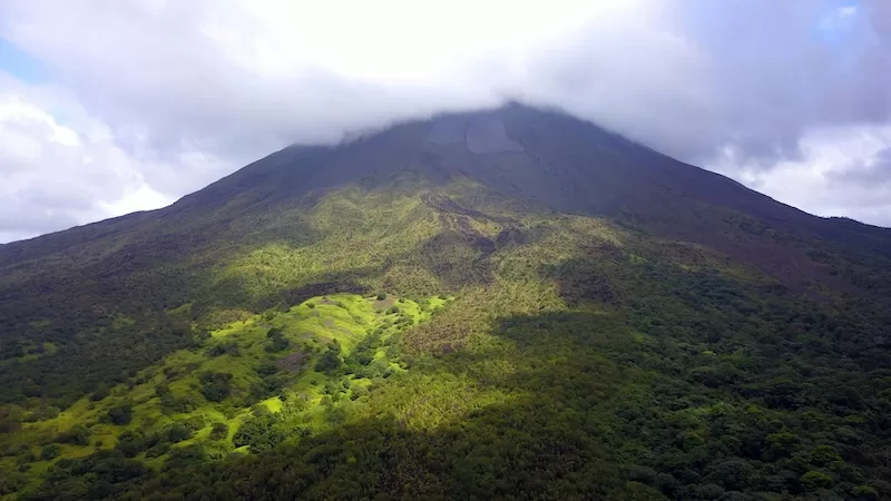 Morning light over Costa Rica’s rainforest canopy, a country that holds 5% of the planet’s biodiversity and runs almost entirely on renewable energy.