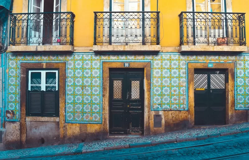 Traditional azulejo façades in Lisbon capture the essence of Portugal’s urban charm: beautiful, historic, but often more expensive than life in smaller towns.