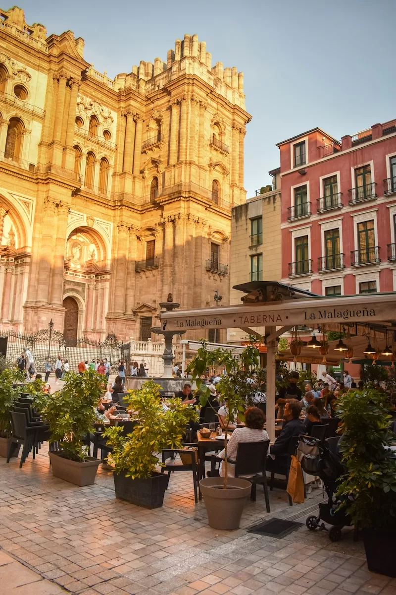 Late afternoon in Málaga, where the pace slows, conversations spill into the street, and every plaza feels like an open invitation to stay a little longer.