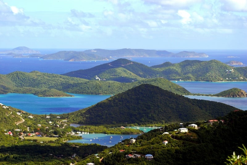 The emerald hills and deep bays of St. Thomas, where city energy meets Caribbean calm.