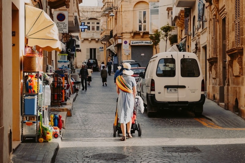 Morning in Sliema. Families, neighbors, and shopkeepers share the streets, small signs of the trust that keeps Malta’s neighborhoods feeling safe and familiar.