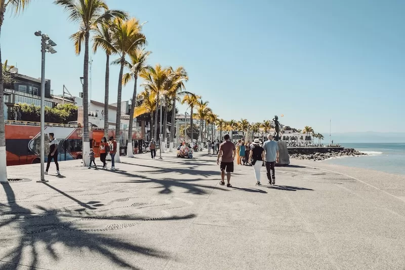 Strolling along Puerto Vallarta’s Malecón, where palm trees, ocean air, and local art create one of Mexico’s most iconic coastal walks.