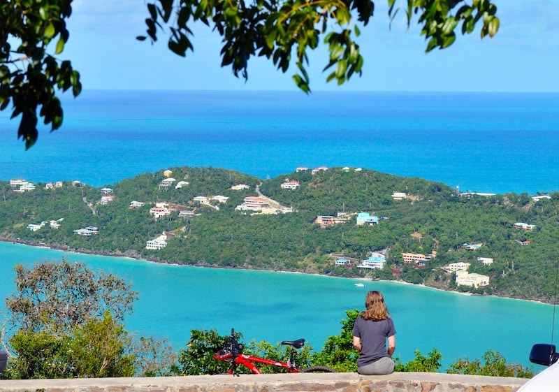 Looking out over turquoise bays and hillside homes — island beauty with a price tag to match.