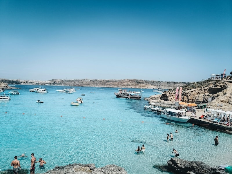 Swimmers at Comino’s Blue Lagoon, part of the 92% of Maltese bathing waters rated “excellent” by the European Environment Agency in 2024.