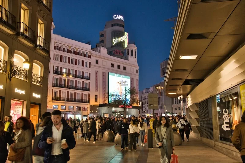 Evening in Callao Square, where the crowd moves in every direction yet somehow everyone has their place — a proof that belonging can take many forms.