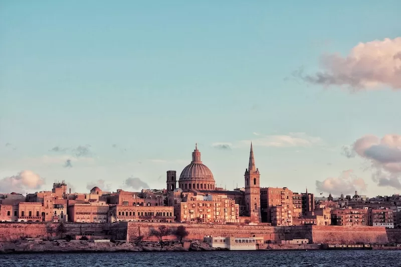 Valletta at sunset: golden stone, sea air, and the quiet rhythm of island life. Malta’s mix of English-speaking ease and EU access makes it one of the most practical gateways to Europe.