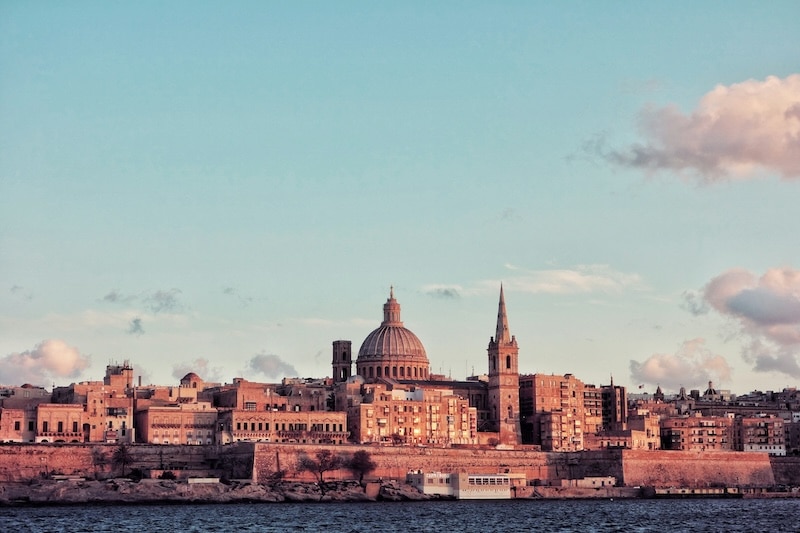 Valletta at sunset: golden stone, sea air, and the quiet rhythm of island life. Malta’s mix of English-speaking ease and EU access makes it one of the most practical gateways to Europe.