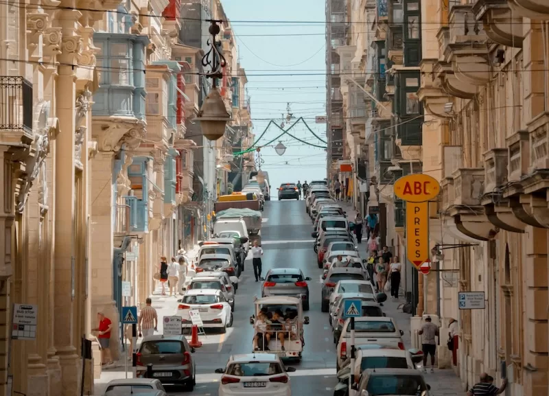 Navigating Valletta’s narrow roads requires calm and courtesy. Drivers yield, pedestrians linger, and the pace rarely feels rushed.