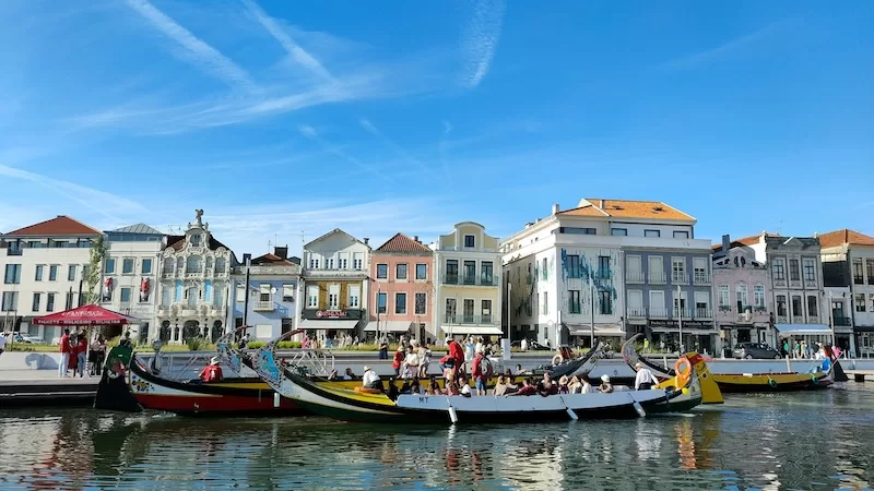 Colorful canals and Art Nouveau façades in Aveiro, a picturesque coastal city offering charm, culture, and lower living costs compared to Lisbon or Porto.