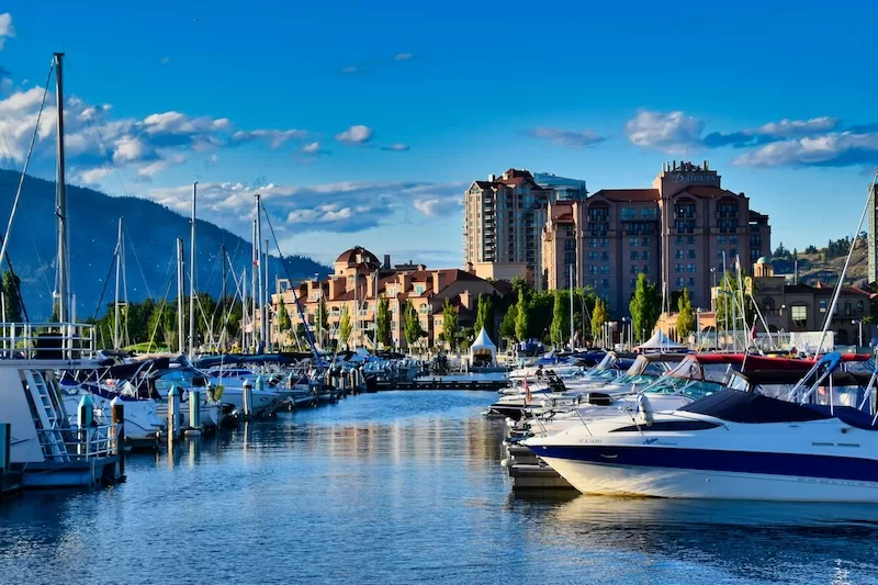 Boats on Okanagan Lake at sunset capture Kelowna’s rhythm: slow mornings, bright days, and evenings best spent with a glass of local wine.