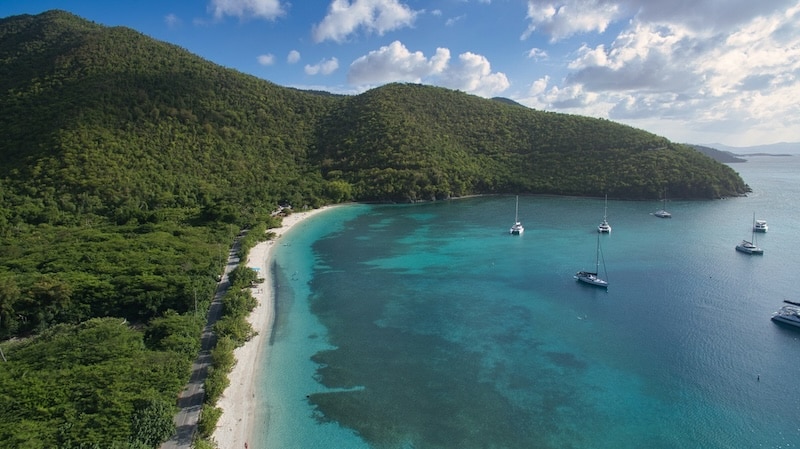 Boats resting between the islands, a daily reminder that in the USVI, the sea connects more than it divides.