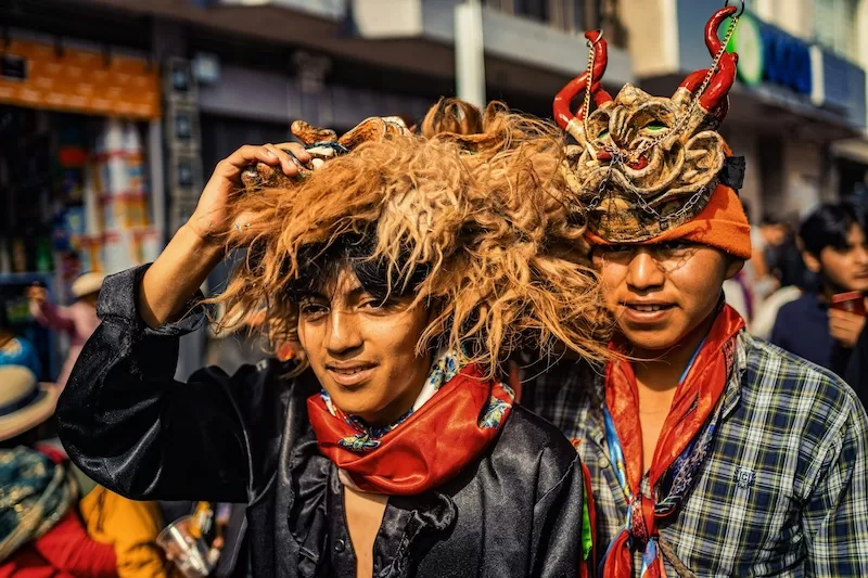 Performers prepare for the Diablada de Píllaro, one of Ecuador’s most famous traditional festivals. As tourism grows, many communities are finding ways to share their culture while keeping ownership of their stories and rituals.