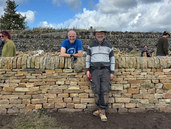 Building Walls: Roger and Mike with the finished Yorkshire wall