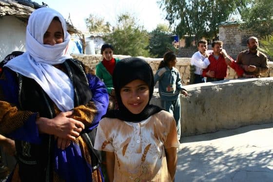 Kurdish women in traditional dress at community gathering in the Kurdistan Region, representing the vibrant cultural life and social fabric of Kurdish society